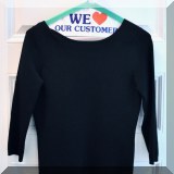 H18. Vince black scoop back knit sweater. Size M - $36 